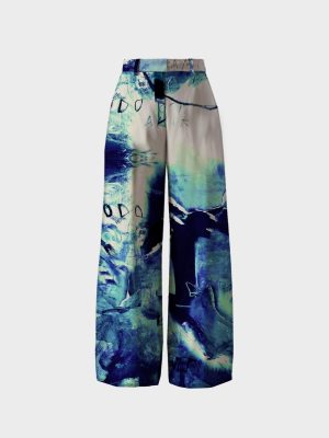 Pantalón Marie Reykja de MNZK con print artístico azul y silueta ancha